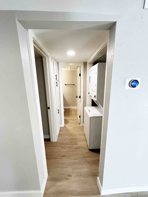 Hallway with new doors and a smart thermostat